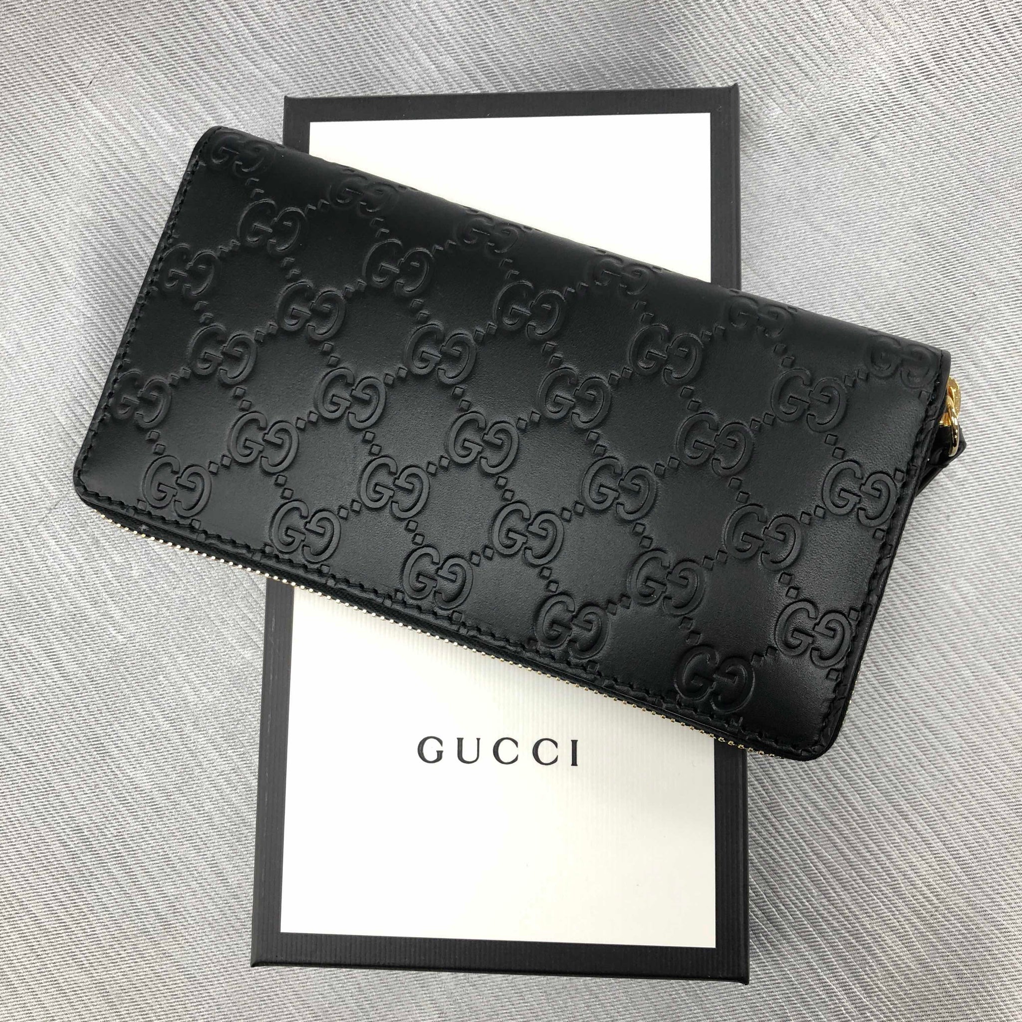Gucci Continental Cat Motif Embossed GG Leather Zip Around Wallet in Black
